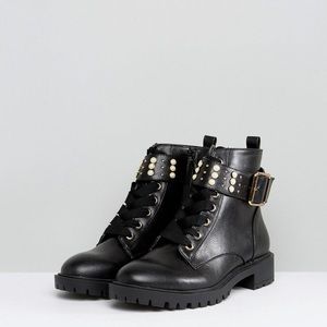 Miss KG from Kurt Geiger booties with pearls.